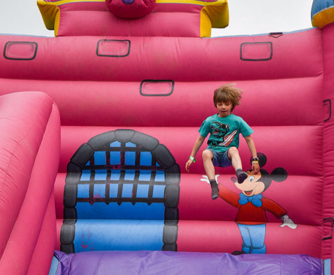 kids playing on bouncy castle